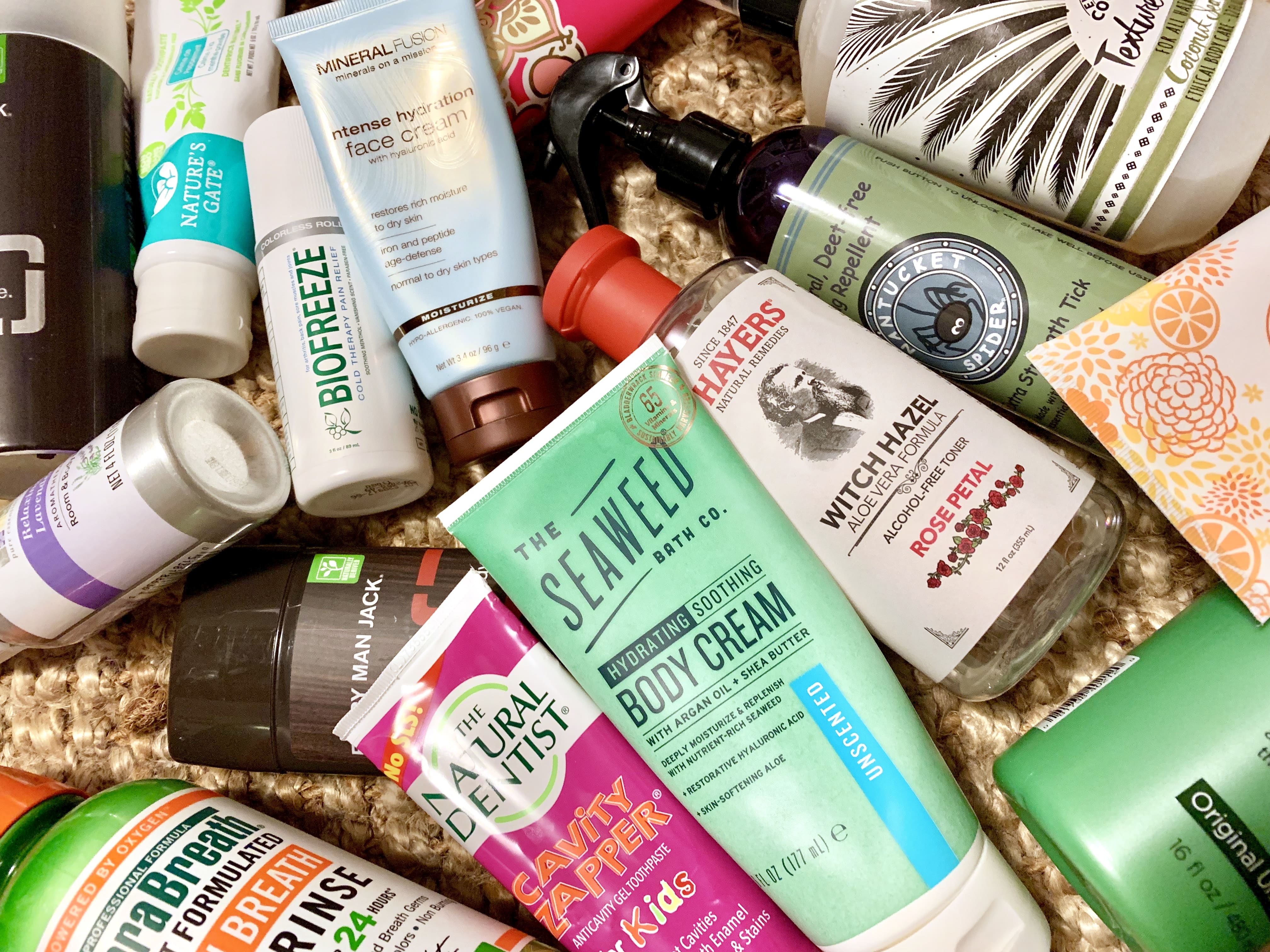 Photo of a bunch of allergy-friendly body products thrown about the floor